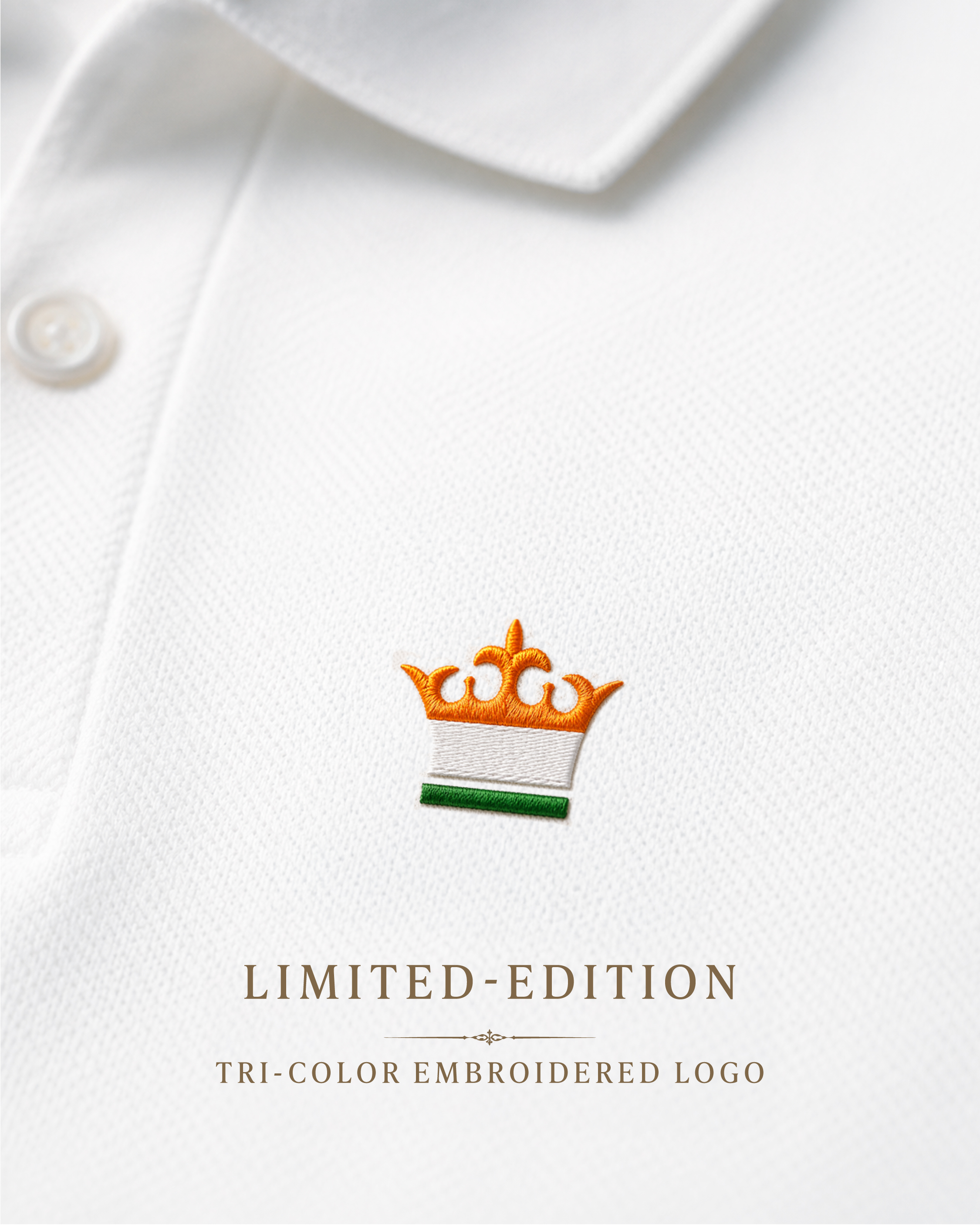Close-up of a white polo shirt featuring a limited-edition tri-color embroidered crown logo in orange, white, and green.